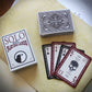 Caught in the Rain Solo Mystery TTRPG Deluxe Bundle Hardcover, Journal and Cards by Ravenridge Press